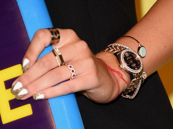 LOS ANGELES, CA - AUGUST 16:  Actress Bella Thorne, jewelry detail, poses in the press room during the Teen Choice Awards 2015 at the USC Galen Center on August 16, 2015 in Los Angeles, California.  (Photo by Jason Merritt/Getty Images)