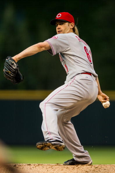 DENVER, CO - AUGUST 30: Bronson Arroyo #61 of the Cincinnati Reds pitches from the stretch against the Colorado Rockies during the first inning of a game at Coors Field on August 30, 2013 in Denver, Colorado. (Photo by Dustin Bradford/Getty Images)