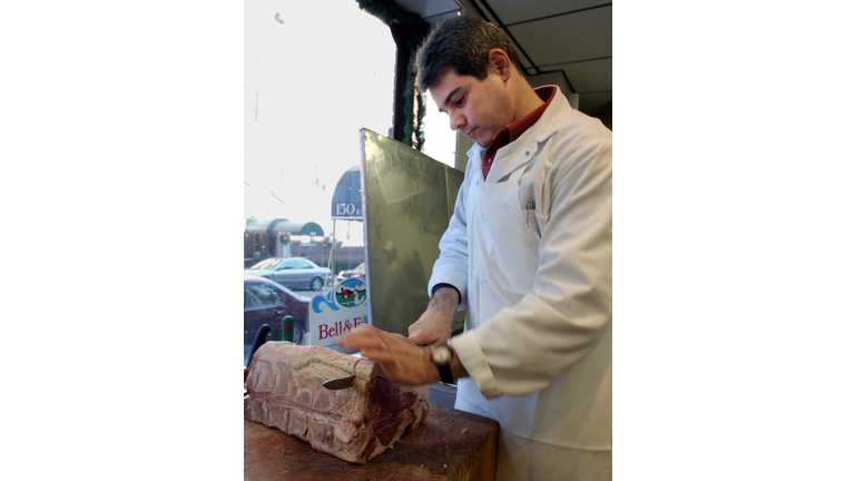 Evan Kemp cuts a prime rib beef roast, 2