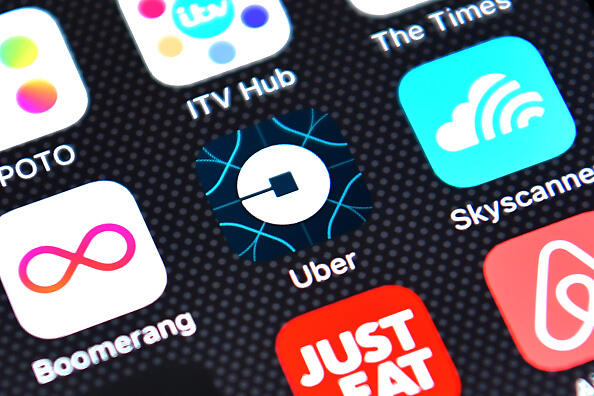 LONDON, ENGLAND - AUGUST 03:  The Uber app logo is displayed on an iPhone on August 3, 2016 in London, England.  (Photo by Carl Court/Getty Images)