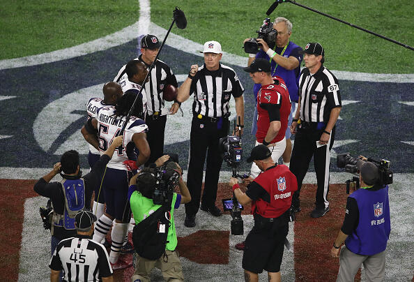 HOUSTON, TX - FEBRUARY 05:  Matt Ryan #2 of the Atlanta Falcons awaits the overtime coin toss with Dont'a Hightower #54, Devin McCourty #32 and Matthew Slater #18 of the New England Patriots  during Super Bowl 51 at NRG Stadium on February 5, 2017 in Houston, Texas.  (Photo by Ezra Shaw/Getty Images)