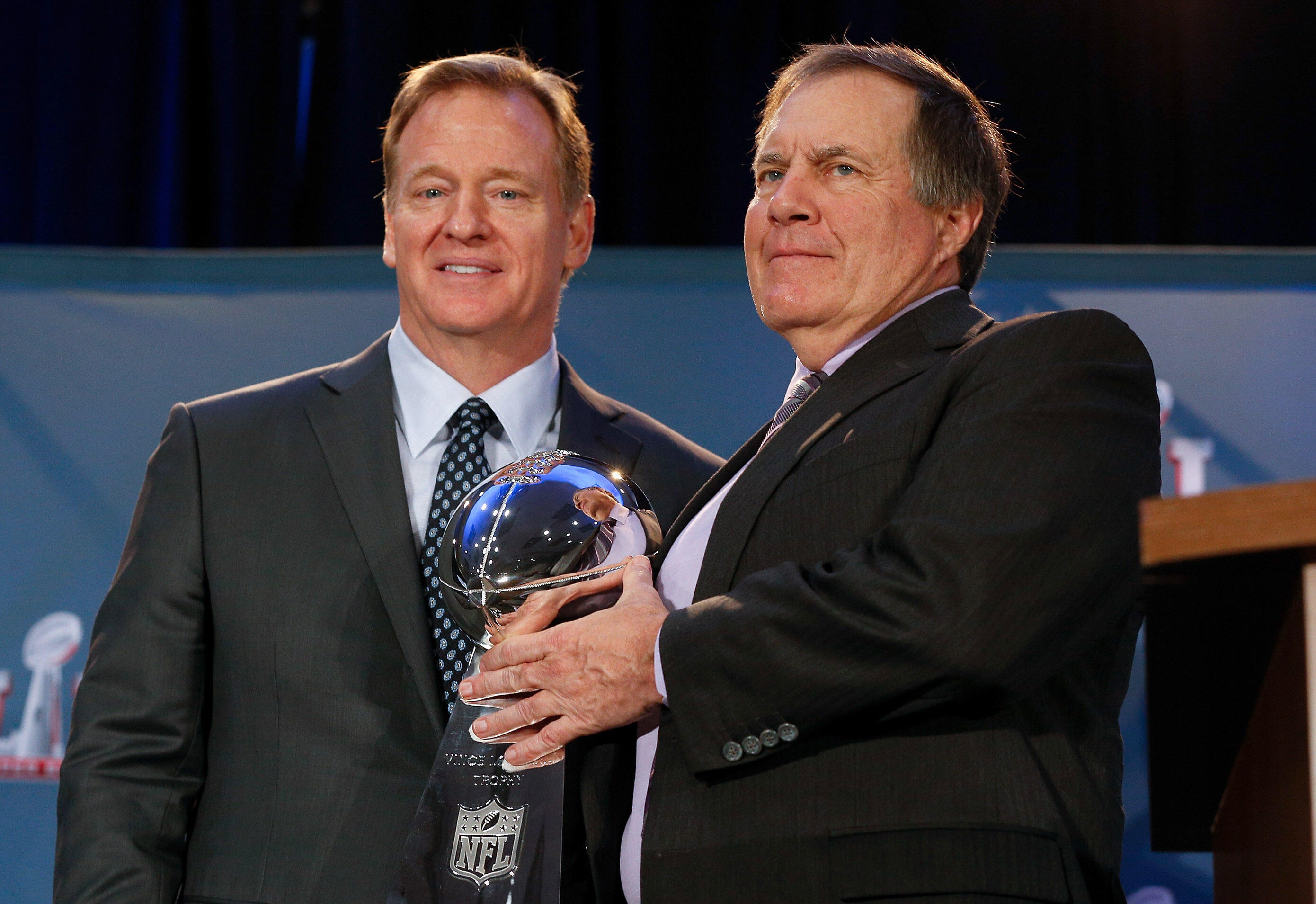 HOUSTON, TX - FEBRUARY 06:  NFL Commissioner Roger Goodell, left, and head coach Bill Belichick of the New England Patriots with the Vince Lombardi Championship Trophy at the Super Bowl Winner and MVP press conference on February 6, 2017 in Houston, Texas