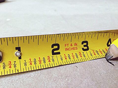 Close-Up Of Yellow Measurement Tape