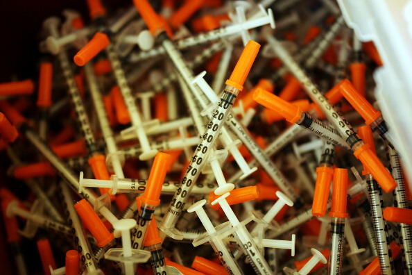 ST. JOHNSBURY, VT - FEBRUARY 06: Used syringes are discarded at a needle exchange clinic where users can pick up new syringes and other clean items for those dependent on heroin on February 6, 2014 in St. Johnsbury, Vermont. Vermont Governor Peter Shumlin recently devoted his entire State of the State speech to the scourge of heroin. Heroin and other opiates have begun to devastate many communities in the Northeast and Midwest leading to a surge in fatal overdoses in a number of states. As prescription painkillers, such as the synthetic opiate OxyContin, become increasingly expensive and regulated, more and more Americans are turning to heroin to fight pain or to get high. Heroin, which has experienced a surge in production in places such as Afghanistan and parts of Central America, has a relatively inexpensive street price and provides a more powerful affect on the user.  (Photo by Spencer Platt/Getty Images)