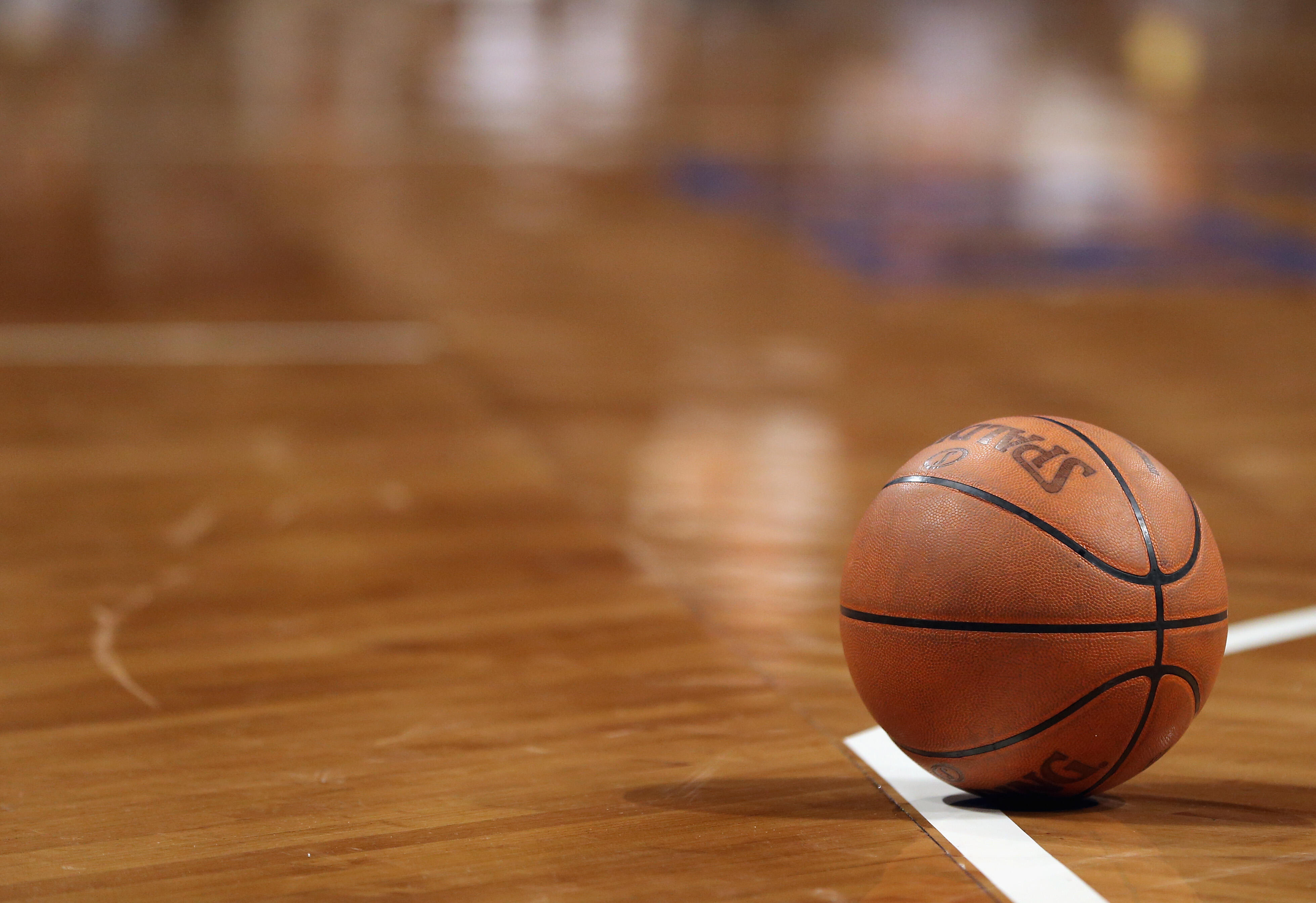 NEW YORK, NY - OCTOBER 19:  A basketball sits on the court during a break in the action between the Brooklyn Nets and the Philadelphia 76ers during preseason action at the Barclays Center on October 19, 2012 in the Brooklyn borough of New York City. The 7