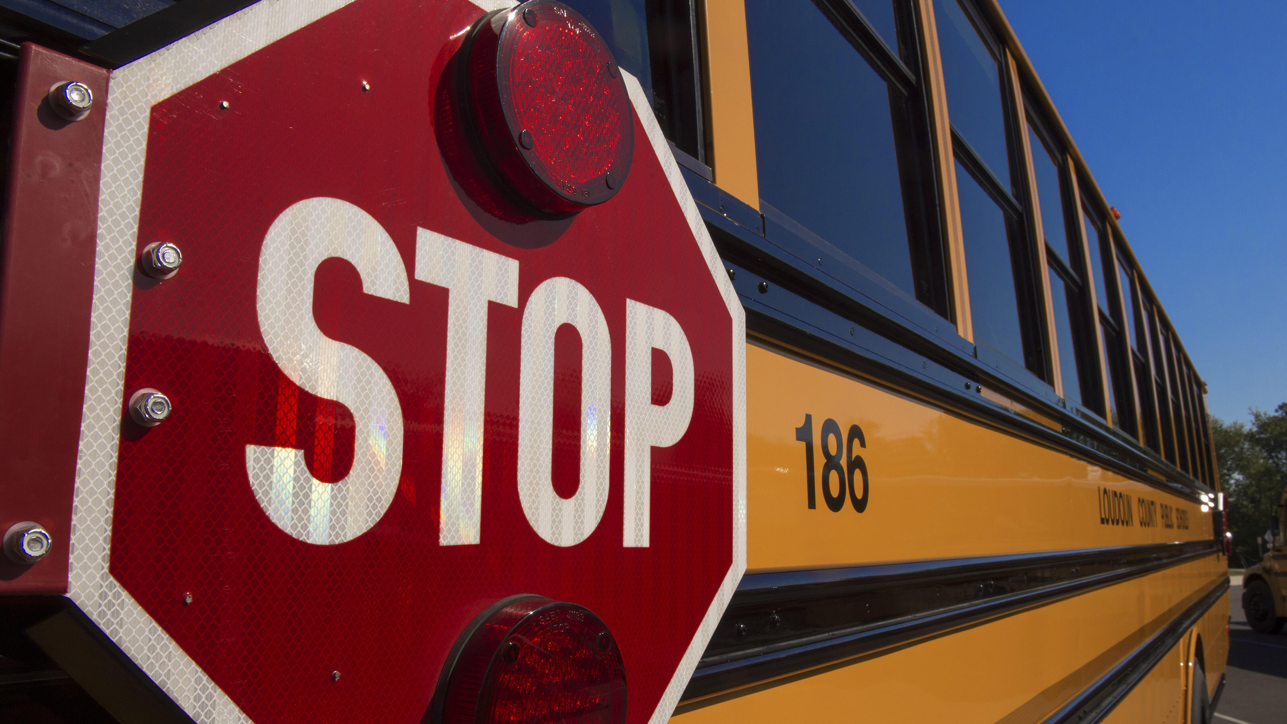 A school bus is seen during a safety event for children at Trailside Middle School, in Ashburn, Virginia on August 25, 2015. AFP PHOTO/PAUL J. RICHARDS        (Photo credit should read PAUL J. RICHARDS/AFP/Getty Images)