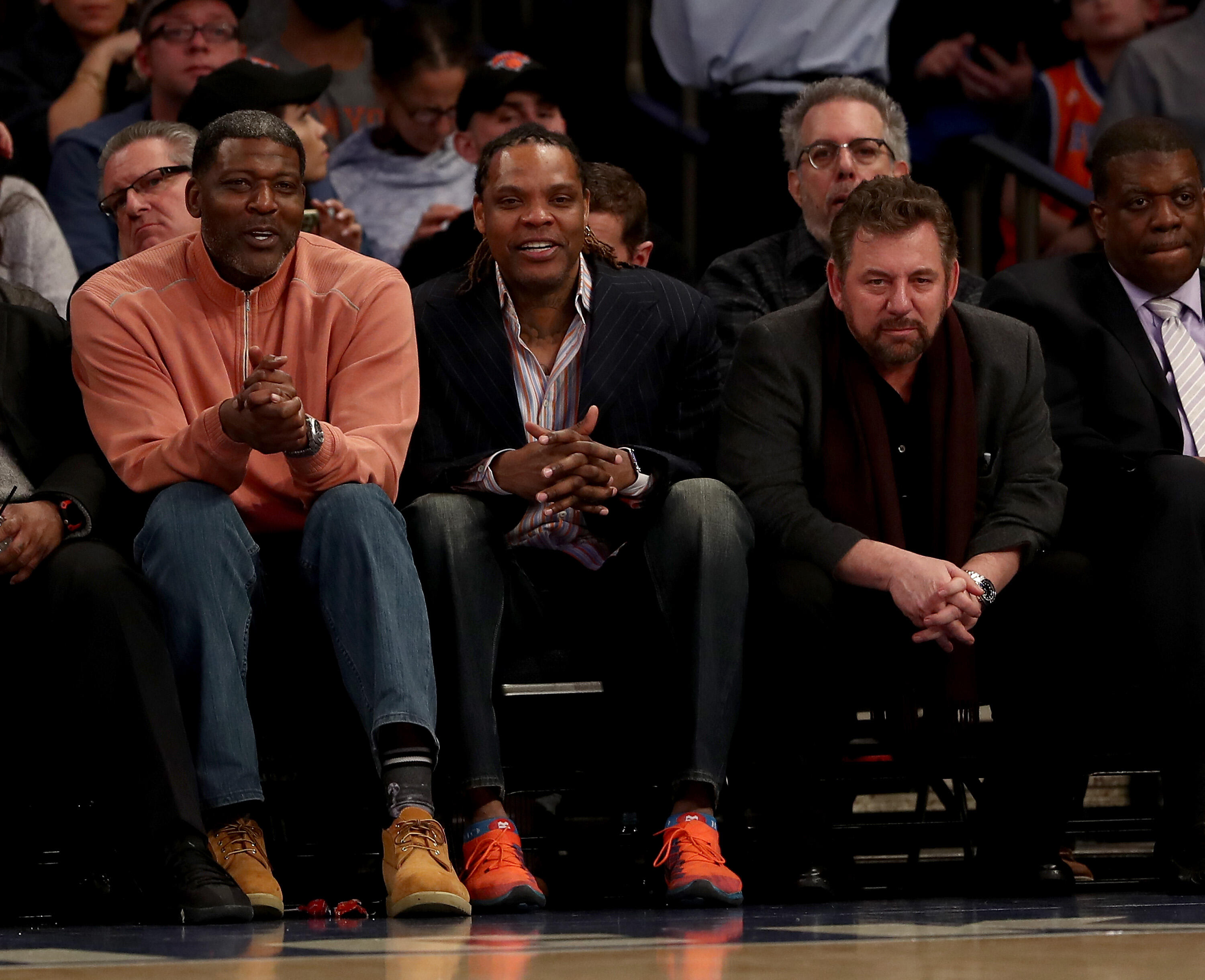 NEW YORK, NY - FEBRUARY 12:  Former New York Knicks playes Larry Johnson and Latrell Spreewell and Knicks owner James Dolan attend the game between the New York Knicks and the San Antonio Spurs at Madison Square Garden on February 12, 2017 in New York Cit