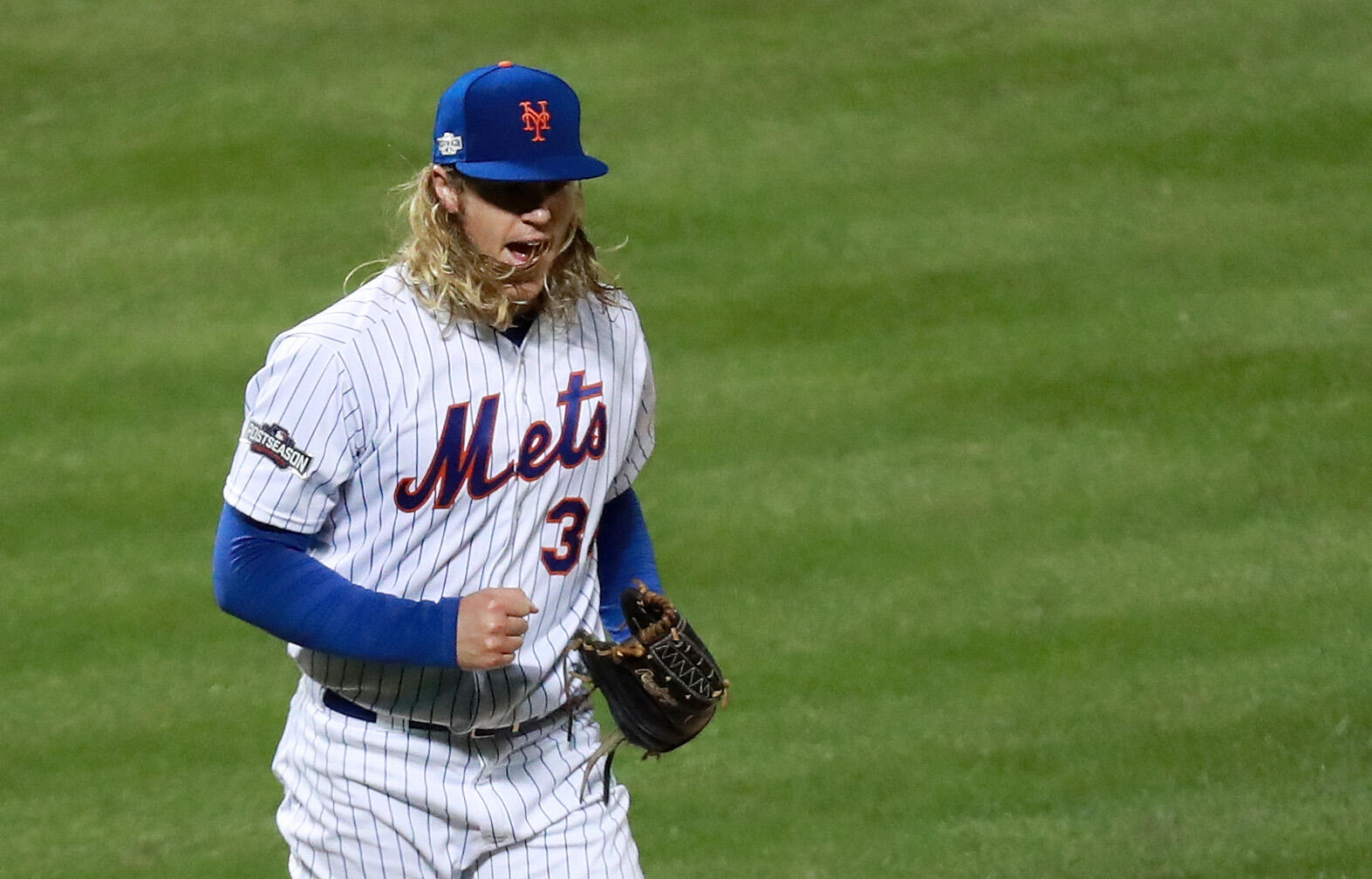 NEW YORK, NY - OCTOBER 05:  Noah Syndergaard #34 of the New York Mets reacts during their National League Wild Card game against the San Francisco Giants at Citi Field on October 5, 2016 in New York City.  (Photo by Michael Reaves/Getty Images)