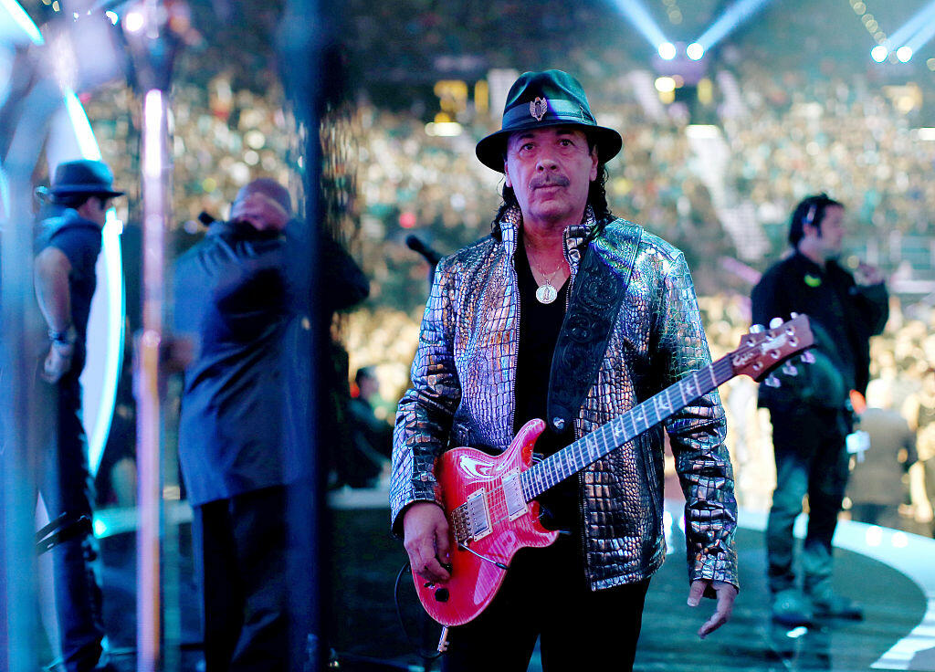 LAS VEGAS, NV - NOVEMBER 20:  Musician Carlos Santana performs onstage during the 15th Annual Latin GRAMMY Awards at the MGM Grand Garden Arena on November 20, 2014 in Las Vegas, Nevada.  (Photo by Christopher Polk/Getty Images for LARAS)