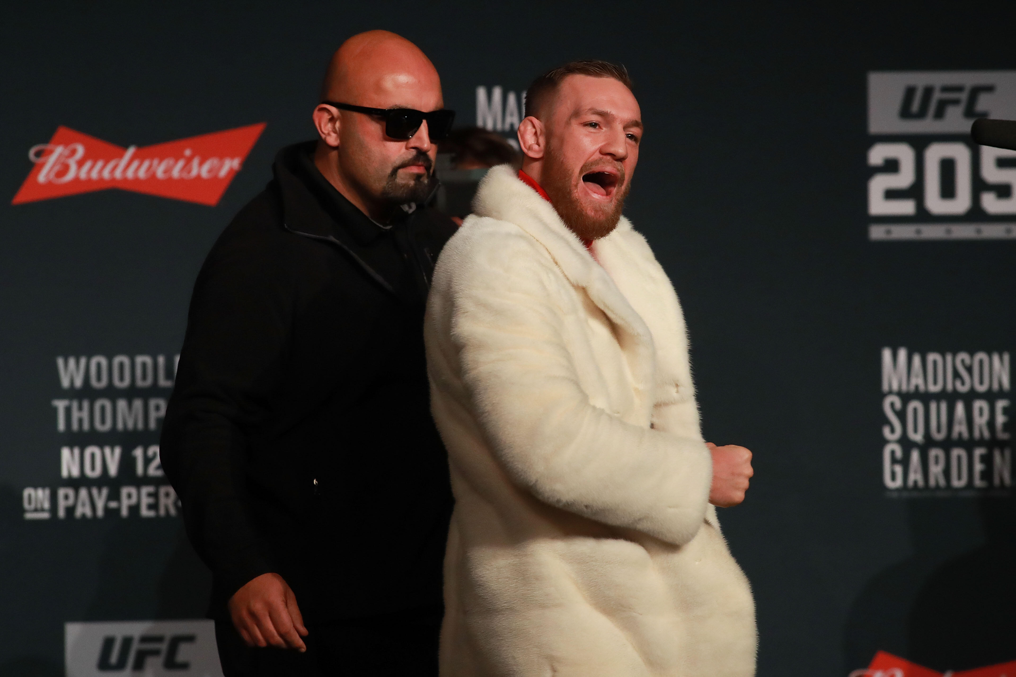 NEW YORK, NY - NOVEMBER 10:  UFC Featherweight Champion Conor McGregor reacts as he leaves the stage after the UFC 205 press conference at The Theater at Madison Square Garden on November 10, 2016 in New York City.  (Photo by Michael Reaves/Getty Images)