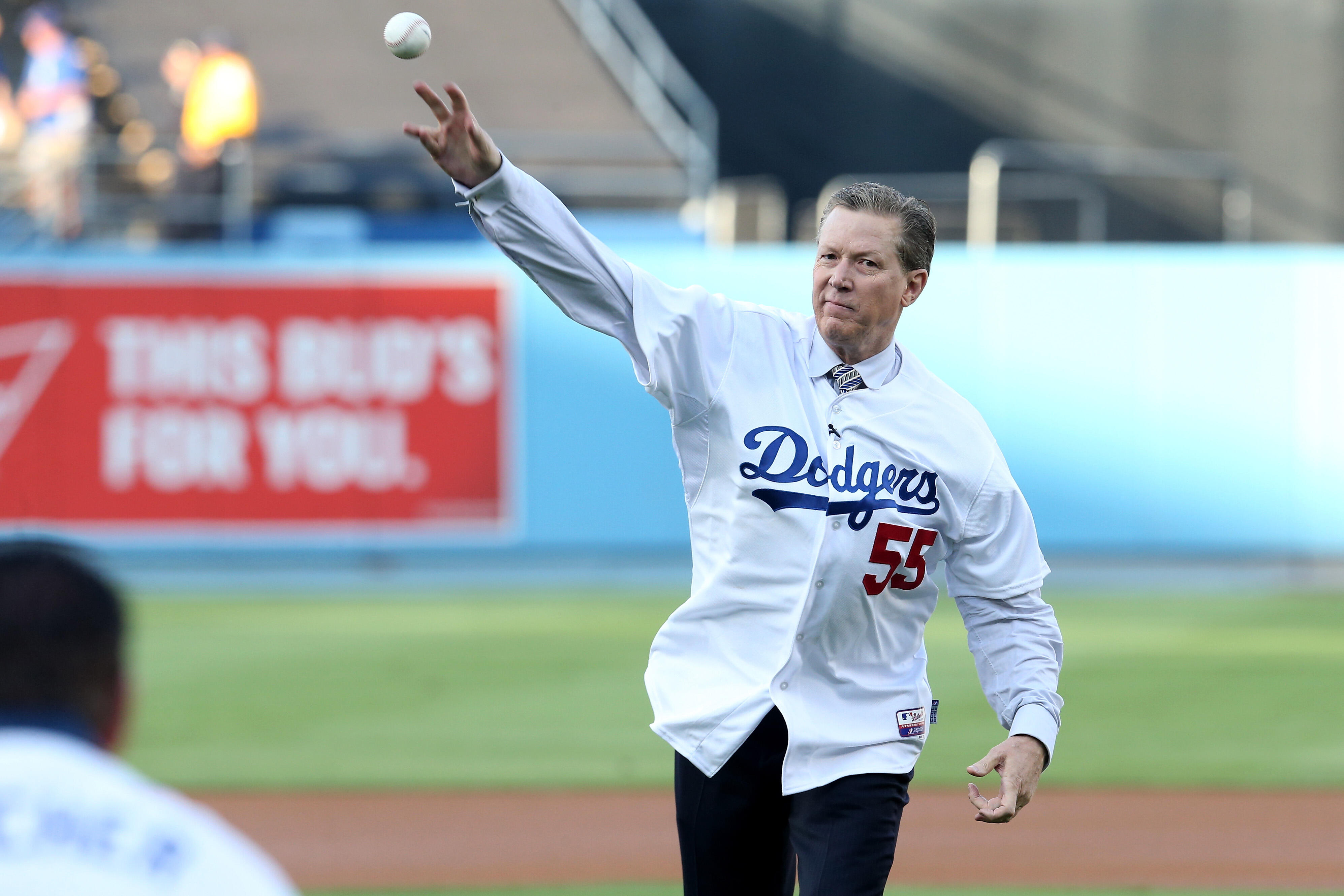 LOS ANGELES, CA - OCTOBER 15:  Los Angeles Dodgers legend Orel Hershiser throws out the ceremonial first pitch before the Dodgers take on the New York Mets in game five of the National League Division Series at Dodger Stadium on October 15, 2015 in Los An