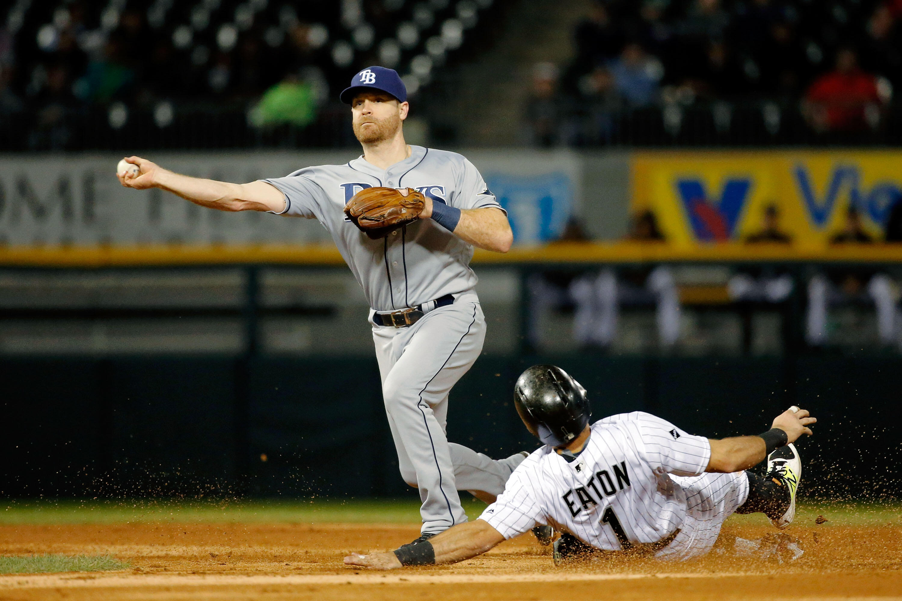 CHICAGO, IL - SEPTEMBER 29: Logan Forsythe #11 of the Tampa Bay Rays throws to first base to complete a double play after forcing out Adam Eaton #1 of the Chicago White Sox during the third inning at U.S. Cellular Field on September 29, 2016 in Chicago, I