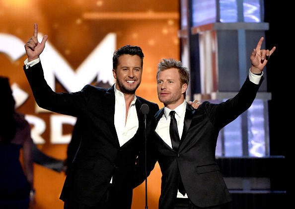 LAS VEGAS, NEVADA - APRIL 03:  Co-hosts Luke Bryan (L) and Dierks Bentley speak onstage during the 51st Academy of Country Music Awards at MGM Grand Garden Arena on April 3, 2016 in Las Vegas, Nevada.  (Photo by Ethan Miller/Getty Images)