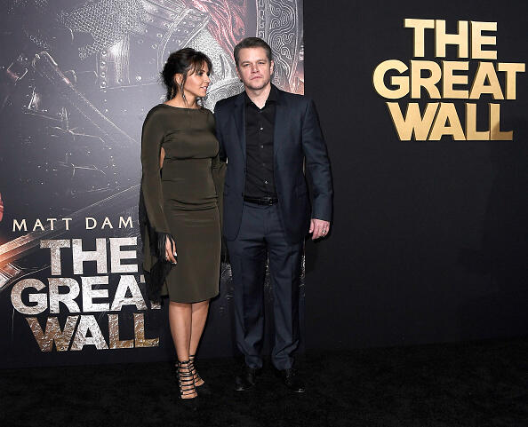 HOLLYWOOD, CA - FEBRUARY 15:  Luciana Barroso (L) and actor Matt Damon attend the premiere of Universal Pictures' 