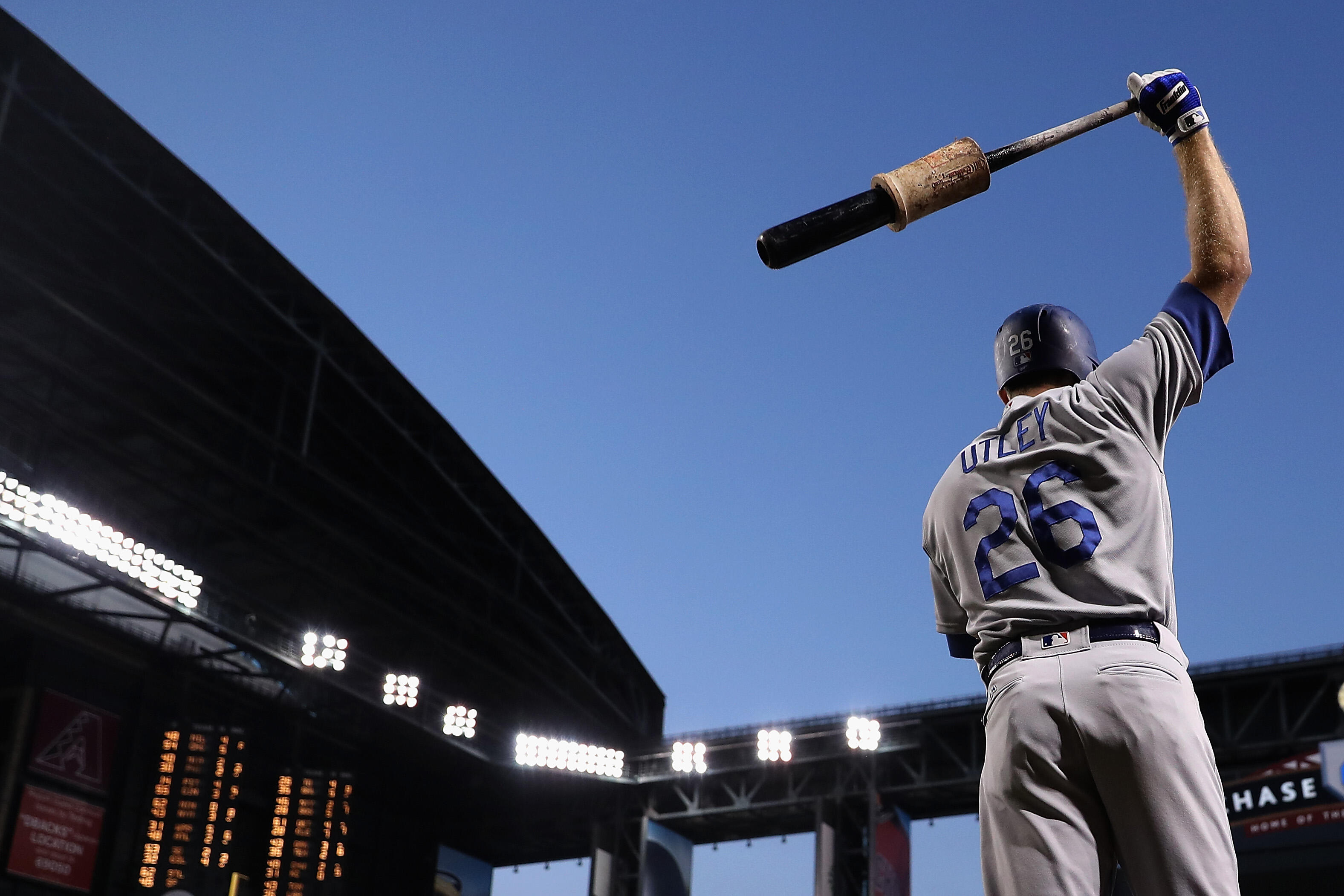 PHOENIX, AZ - SEPTEMBER 16:  Chase Utley #26 of the Los Angeles Dodgers warms up on deck during the first inning of the MLB game against the Arizona Diamondbacks at Chase Field on September 16, 2016 in Phoenix, Arizona.  (Photo by Christian Petersen/Getty