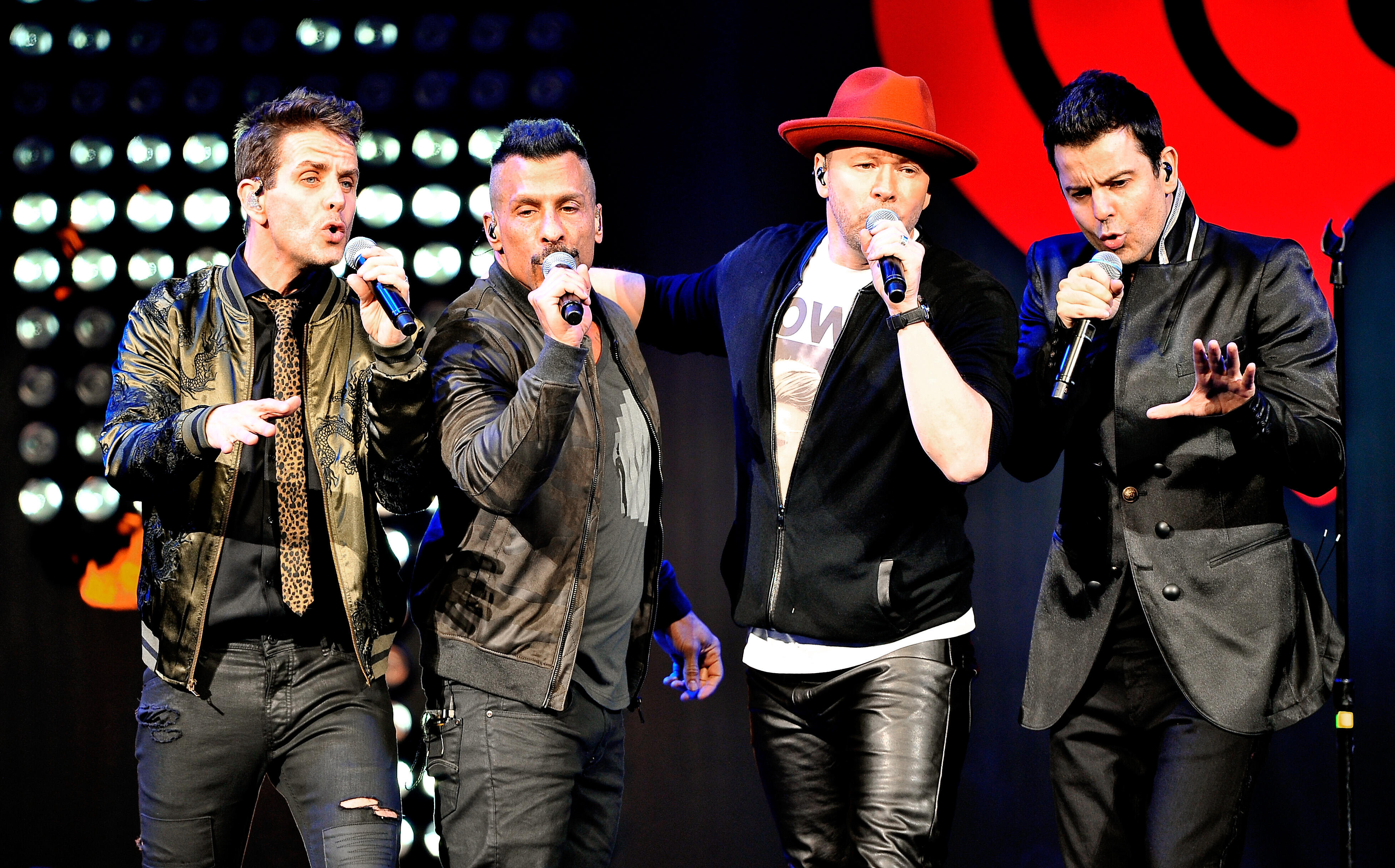 SAN JOSE, CA - JANUARY 28: (L-R) Singers Joey McIntyre, Danny Wood, Donnie Wahlberg and Jordan Knight of New Kids On The Block perform on stage during the iHeart80s Party 2017 at SAP Center on January 28, 2017 in San Jose, California.  (Photo by Steve Jen