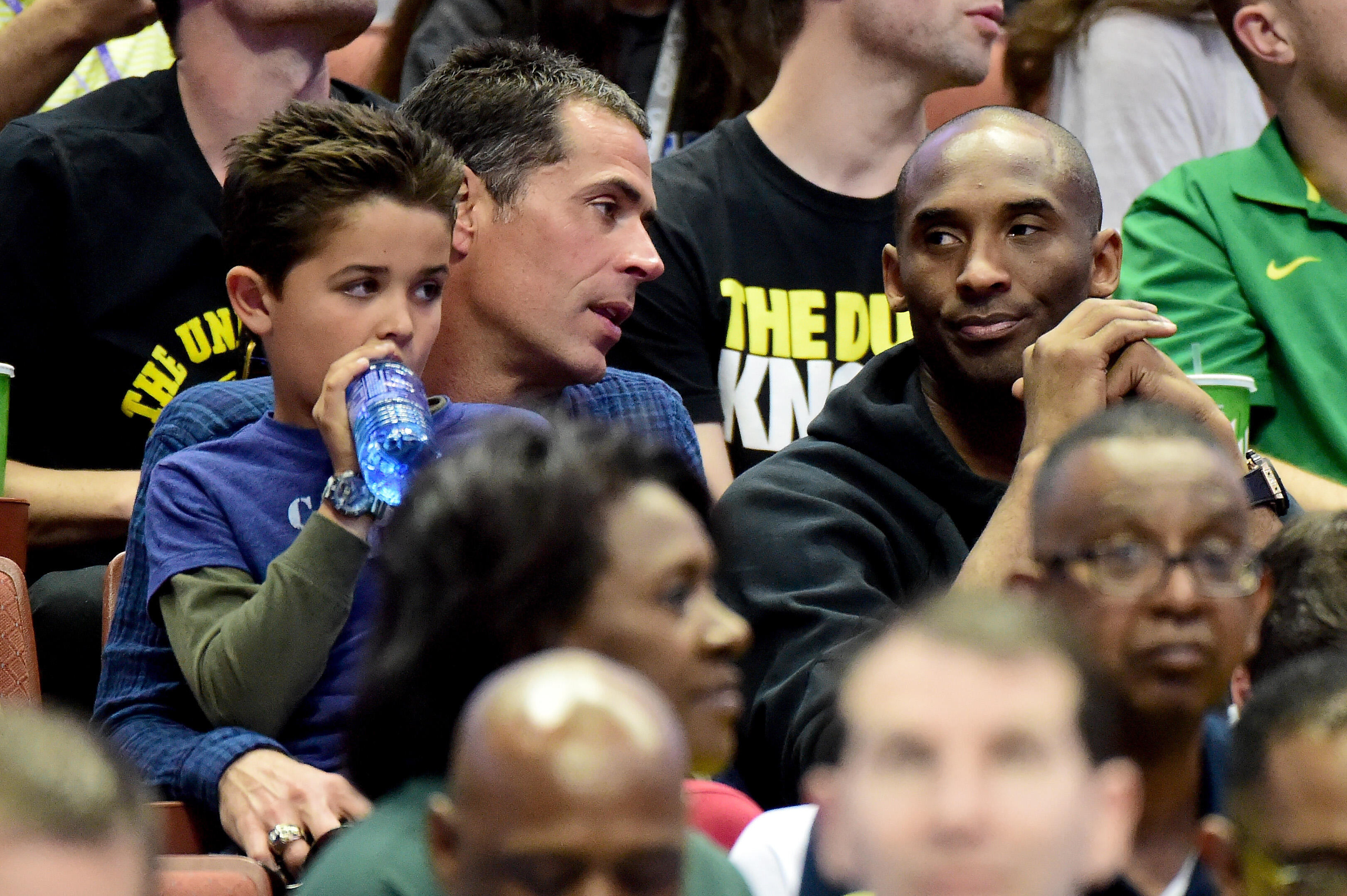 ANAHEIM, CA - MARCH 26:  Agent Rob Pelinka talks with Kobe Bryant during the NCAA Men's Basketball Tournament West Regional Final at Honda Center on March 26, 2016 in Anaheim, California.  (Photo by Harry How/Getty Images)