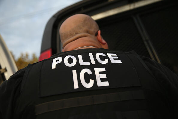 LOS ANGELES, CA - OCTOBER 14:  U.S. Immigration and Customs Enforcement (ICE), agents detain an immigrant on October 14, 2015 in Los Angeles, California. ICE agents said the immigrant, a legal resident with a Green Card, was a convicted criminal and member of the Alabama Street Gang in the Canoga Park area. ICE builds deportation cases against thousands of immigrants living in the United States. Green Card holders are also vulnerable to deportation if convicted of certain crimes. The number of ICE detentions and deportations from California has dropped since the state passed the Trust Act in October 2013, which set limits on California state law enforcement cooperation with federal immigration authorities.  (Photo by John Moore/Getty Images)