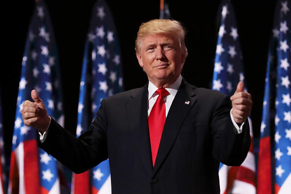 CLEVELAND, OH - JULY 21:  Republican presidential candidate Donald Trump gives two thumbs up to the crowd during the evening session on the fourth day of the Republican National Convention on July 21, 2016 at the Quicken Loans Arena in Cleveland, Ohio. Republican presidential candidate Donald Trump received the number of votes needed to secure the party's nomination. An estimated 50,000 people are expected in Cleveland, including hundreds of protesters and members of the media. The four-day Republican National Convention kicked off on July 18.  (Photo by Chip Somodevilla/Getty Images)