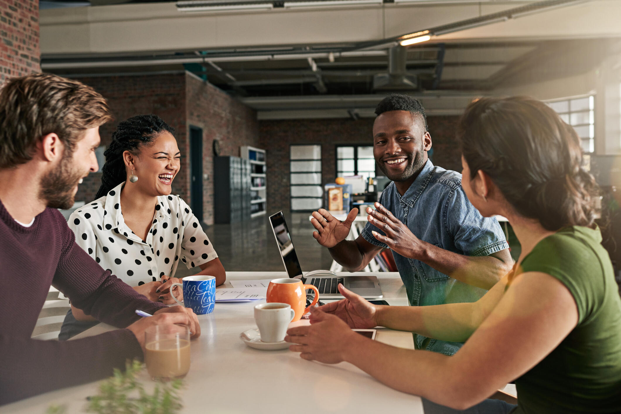 Shot of a team of colleagues having a meeting in a modern office