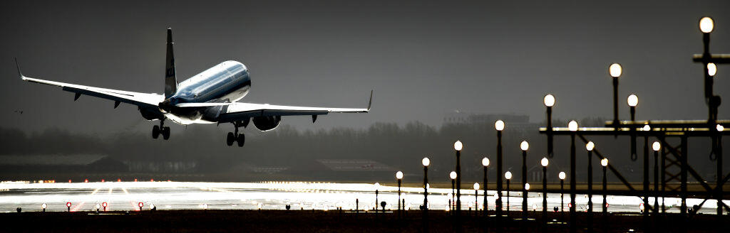 This picture taken on February 23, 2017, shows an airplane taking off from Schiphol Airport at Schiphol.  There is a heavy storm over the Netherlands with wind guts of 100-120 kilometers per hour. / AFP / ANP / Koen van Weel / Netherlands OUT        (Photo credit should read KOEN VAN WEEL/AFP/Getty Images)