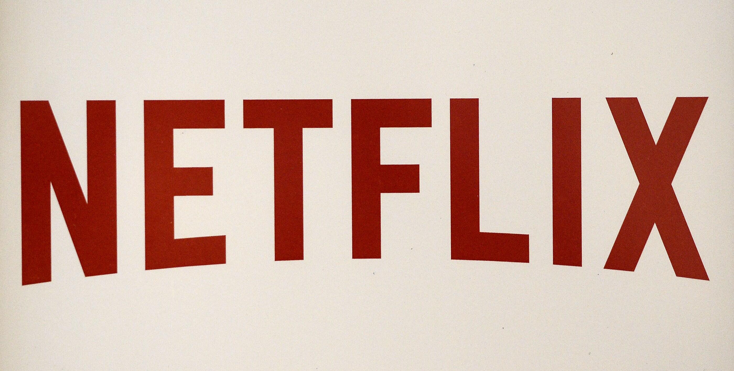 The Netflix logo is pictured on September 15, 2014 in Paris. US online streaming giant Netflix will launch the second phase of its European expansion plan as it sets about seducing French viewers with a 