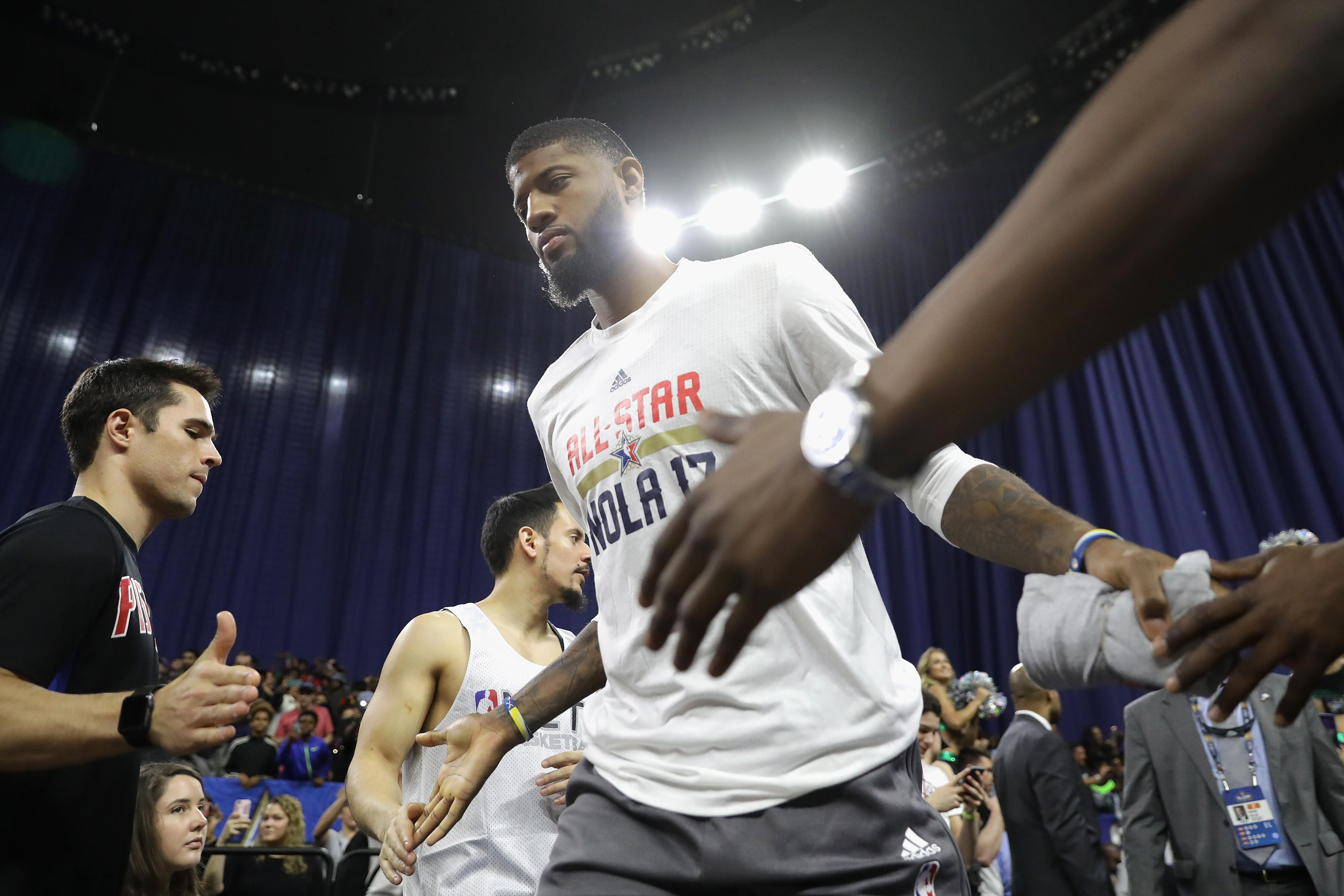 NEW ORLEANS, LA - FEBRUARY 18:  Paul George #13 of the Indiana Pacers greets fans prior to practice for the 2017 NBA All-Star Game at the Mercedes-Benz Superdome on February 18, 2017 in New Orleans, Louisiana.  (Photo by Ronald Martinez/Getty Images)