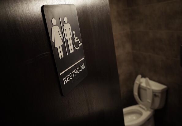 A gender neutral bathroom is seen at a coffee shop in Washington, DC, on May 5, 2016. A heated national debate over access to bathrooms by transgenders is sweeping the United States, with schools and businesses grappling with the issue that has become a hot topic in the presidential campaign. The so-called 