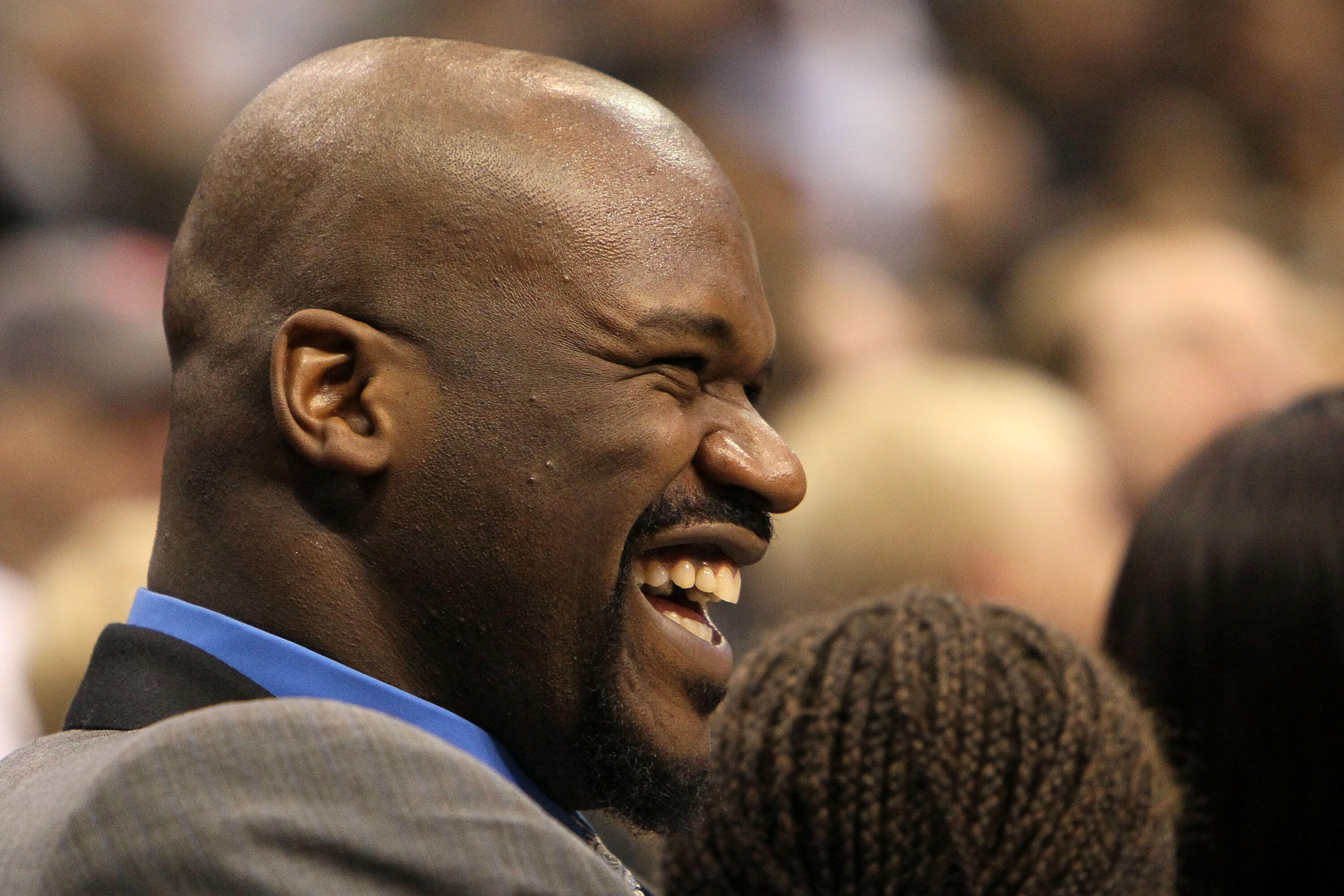 DALLAS - FEBRUARY 13:  Shaquille O'Neal #33 of the Cleveland Cavaliers laughs as he watches the Haier Shooting Stars Competition on All-Star Saturday Night, part of 2010 NBA All-Star Weekend at American Airlines Center on February 13, 2010 in Dallas, Texa