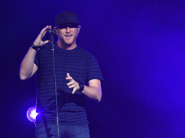 NASHVILLE, TN - OCTOBER 13:  Cole Swindell performs on Florida Georgia Line Dig Your Roots 2016 Tour at Bridgestone Arena on October 13, 2016 in Nashville, Tennessee.  (Photo by Rick Diamond/Getty Images)