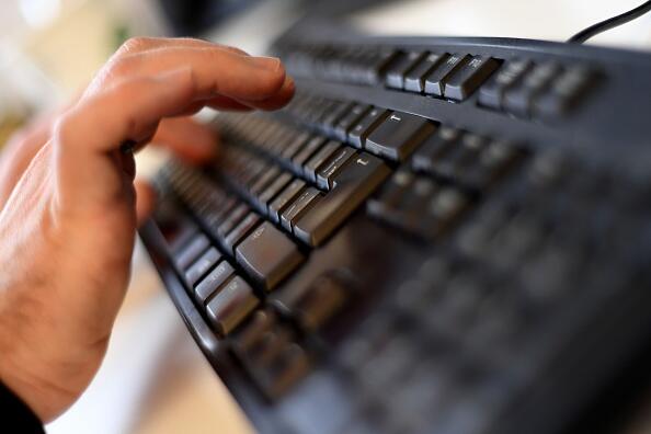 A picture taken on October 17, 2016 shows an employee typing on a computer keyboard at the headquarters of Internet security giant Kaspersky in Moscow. / AFP / Kirill KUDRYAVTSEV / TO GO WITH AFP STORY BY Thibault MARCHAND        (Photo credit should read KIRILL KUDRYAVTSEV/AFP/Getty Images)