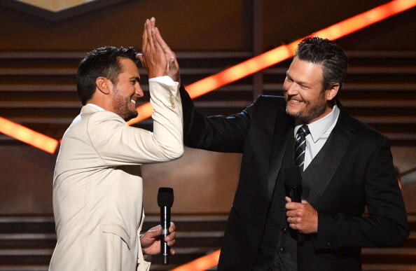 LAS VEGAS, NV - APRIL 06:  Co-hosts Luke Bryan (L) and Blake Shelton speak onstage during the 49th Annual Academy of Country Music Awards at the MGM Grand Garden Arena on April 6, 2014 in Las Vegas, Nevada.  (Photo by Ethan Miller/Getty Images)