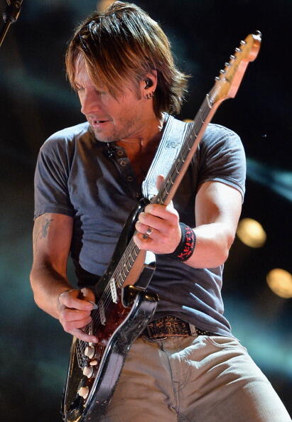NASHVILLE, TN - JUNE 08:  Musician Keith Urban performs during the 2013 CMA Music Festival on June 8, 2013 at LP Field in Nashville, Tennessee.  (Photo by Rick Diamond/Getty Images)