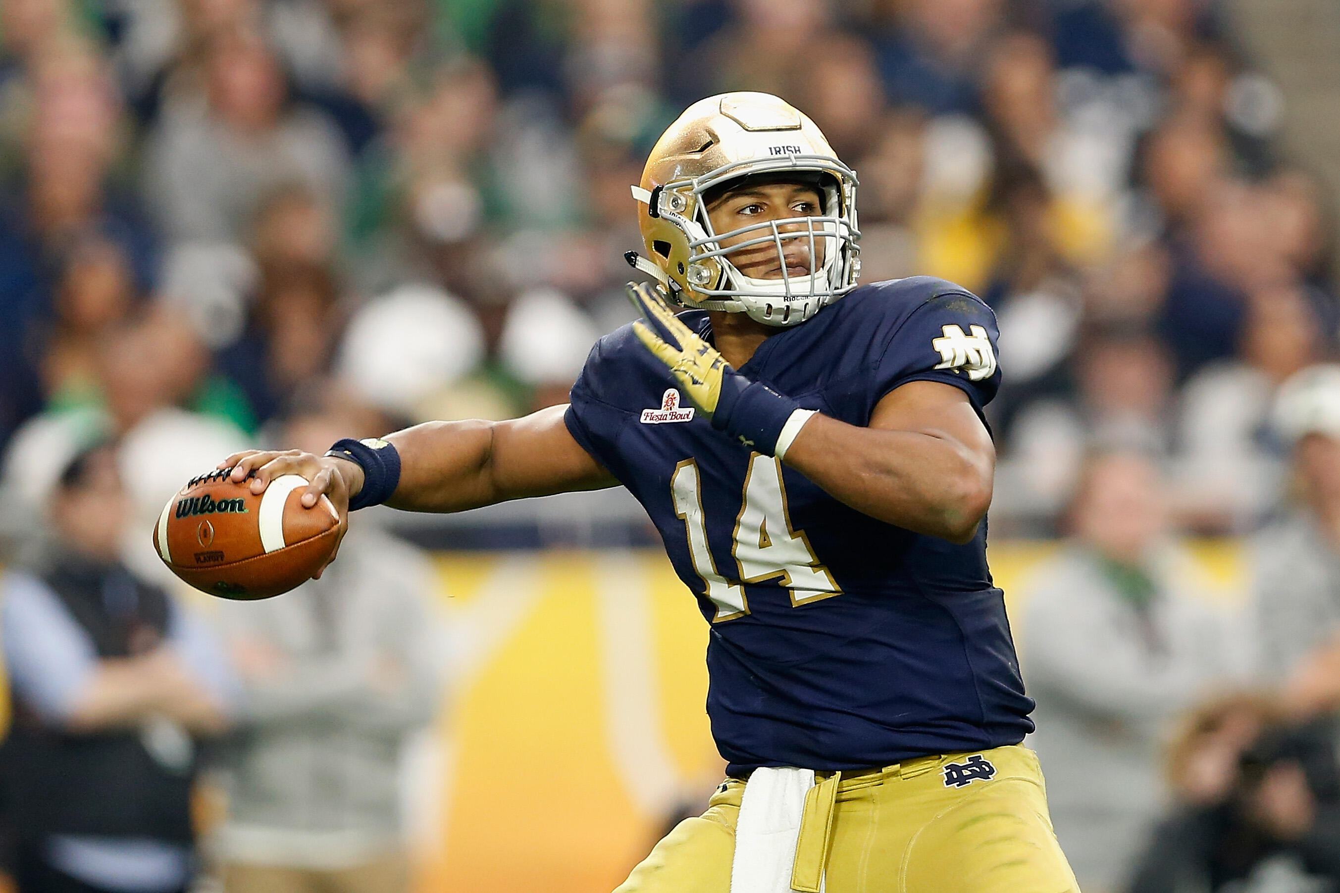GLENDALE, AZ - JANUARY 01:  Quarterback DeShone Kizer #14 of the Notre Dame Fighting Irish throws a pass during the BattleFrog Fiesta Bowl against the Ohio State Buckeyes at University of Phoenix Stadium on January 1, 2016 in Glendale, Arizona. The Buckey