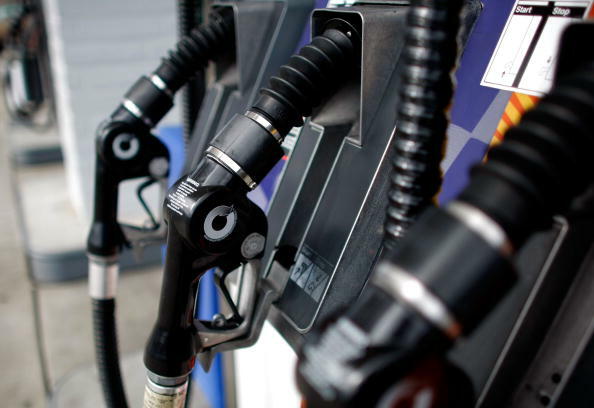 SAN RAFAEL, CA - FEBRUARY 22:  Gas nozzles hang on their pumps at a Union 76 gas station February 22, 2008 in San Rafael, California. Gas prices surged to their highest level since June 2007 with the price of a gallon of regular unleaded increasing 2.9 ce