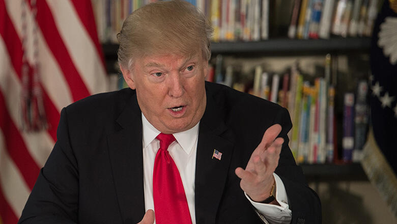 US President Donald Trump speaks as he meets with parents and teachers at Saint Andrew Catholic School in Orlando, Florida, on March 3, 2017. / AFP PHOTO / NICHOLAS KAMM        (Photo credit should read NICHOLAS KAMM/AFP/Getty Images)