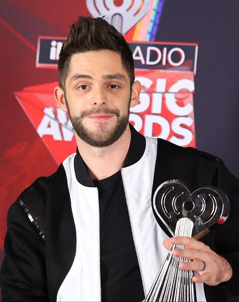 INGLEWOOD, CA - MARCH 05: Thomas Rhett poses during the 2017 iHeartRadio Music Awards at The Forum on March 5, 2017 in Inglewood, California. (Photo by JB Lacroix/WireImage)