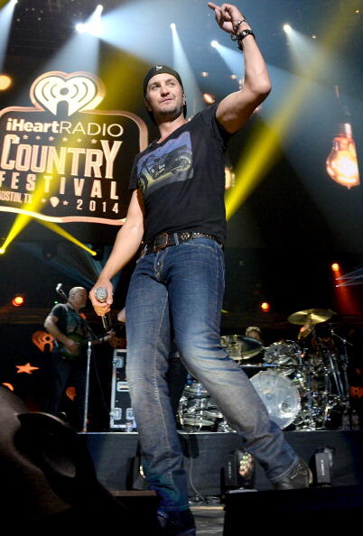 AUSTIN, TX - MARCH 29:  Recording artist Luke Bryan performs onstage during iHeartRadio Country Festival in Austin at the Frank Erwin Center on March 29, 2014 in Austin, Texas.  (Photo by Rick Diamond/Getty Images for Clear Channel)