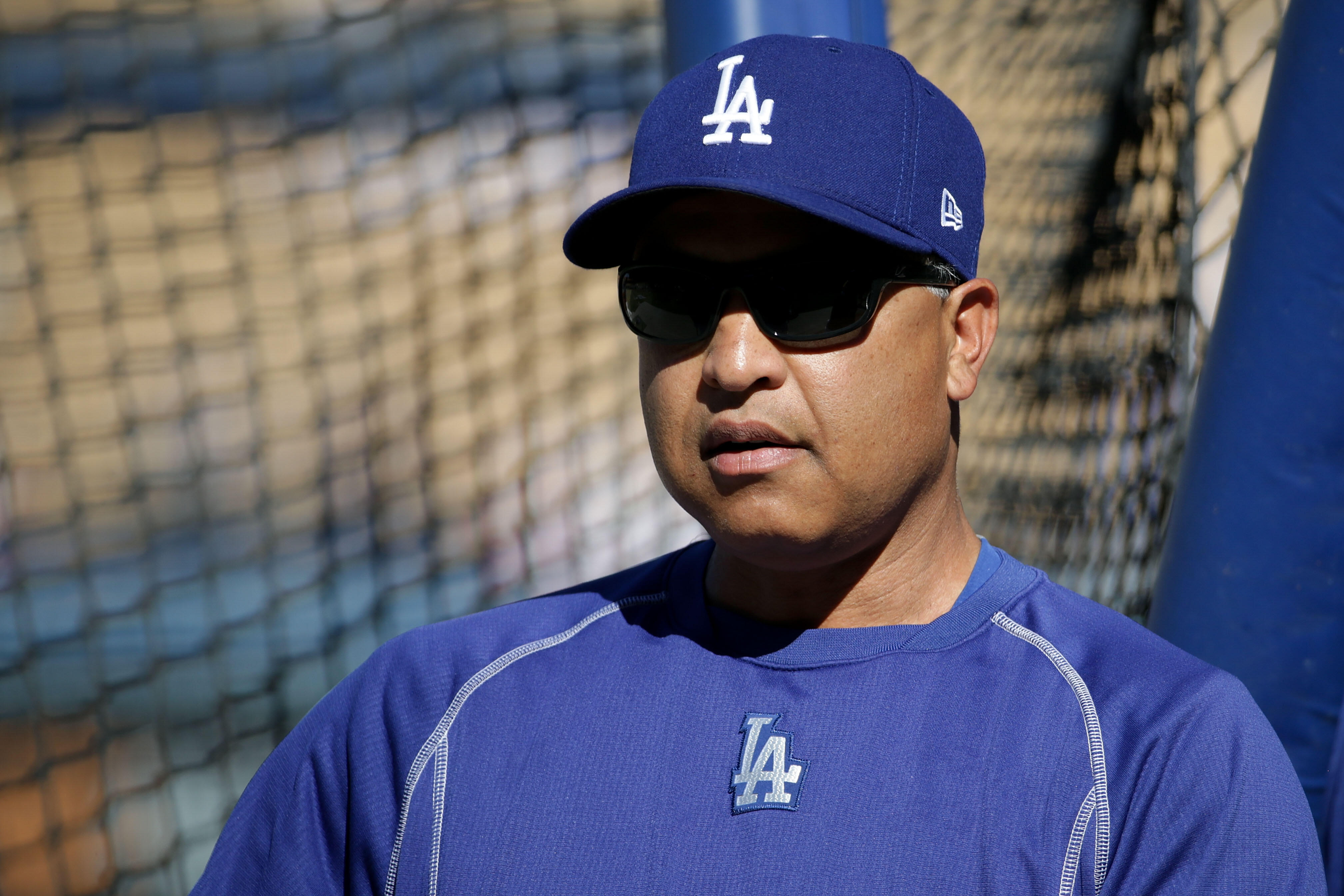 Los Angeles Dodgers manager Dave Roberts (30) looks on before the