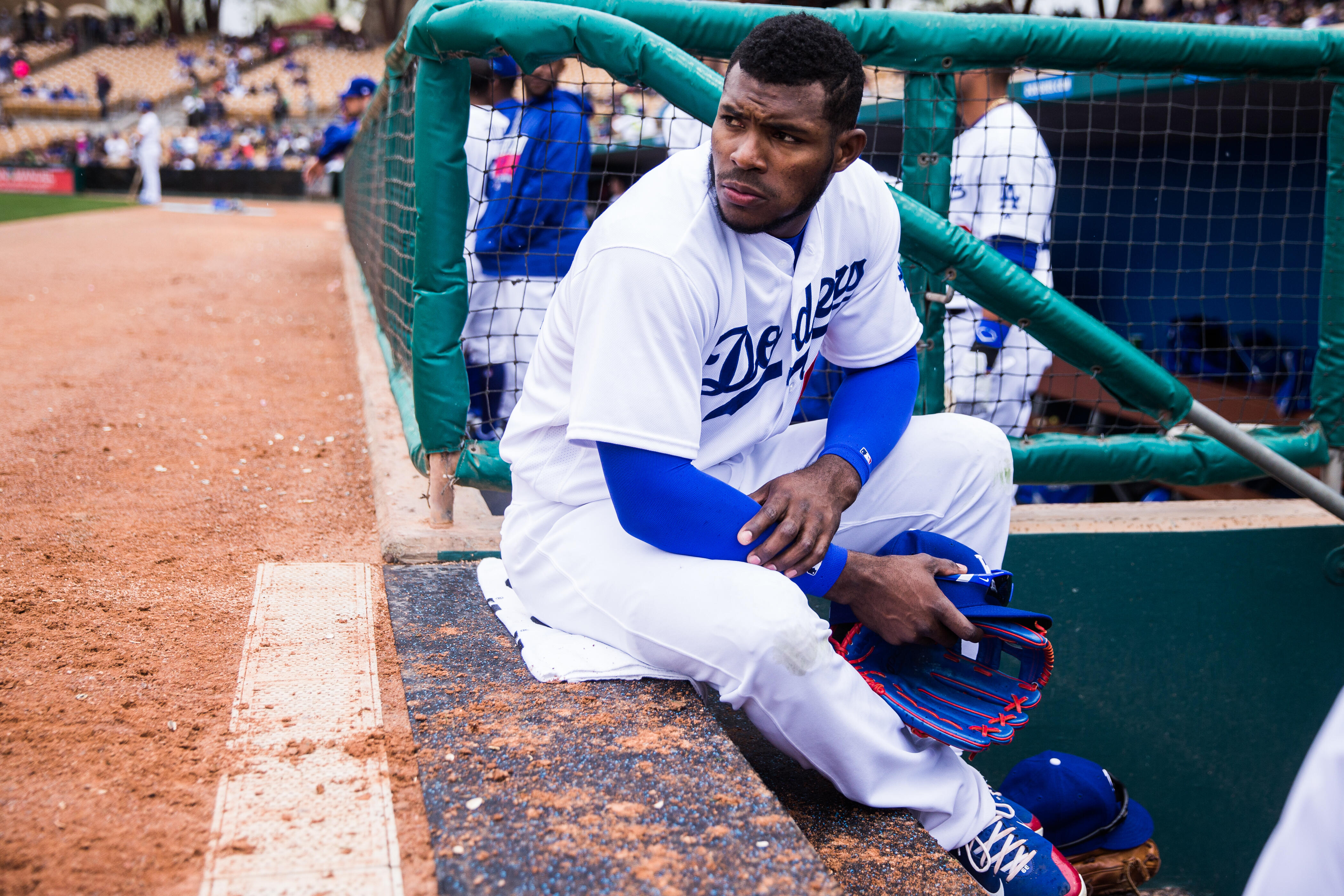 GLENDALE, AZ - FEBRUARY 27:  Yasiel Puig #66 of the Los Angeles Dodgers looks on during a spring training game against the Colorado Rockies at Camelback Ranch on February 27, 2017 in Glendale, Arizona. (Photo by Rob Tringali/Getty Images)