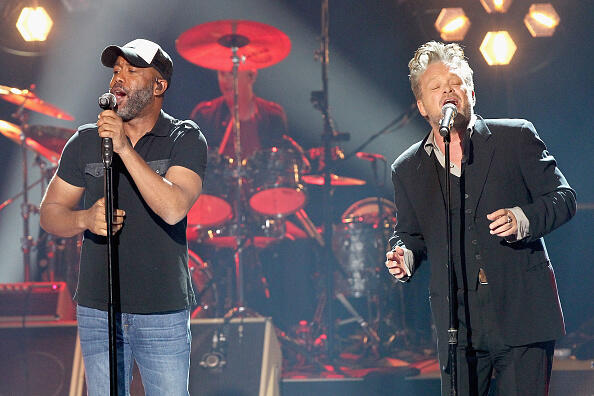 NASHVILLE, TN - FEBRUARY 24:  Recording artists  Darius Rucker (L) and John Mellencamp (R) perform onstage during CMT Crossroads: John Mellencamp and Darius Rucker on February 24, 2017 in Nashville, Tennessee.  (Photo by Terry Wyatt/Getty Images for CMT)