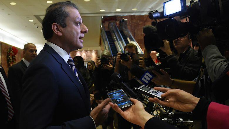 US Attorney for the Southern District of New York  Preet Bharara talks to the press at Trump Tower on another day of  meetings with US President-elect  Donald Trump on November 30, 2016. / AFP / TIMOTHY A. CLARY        (Photo credit should read TIMOTHY A.