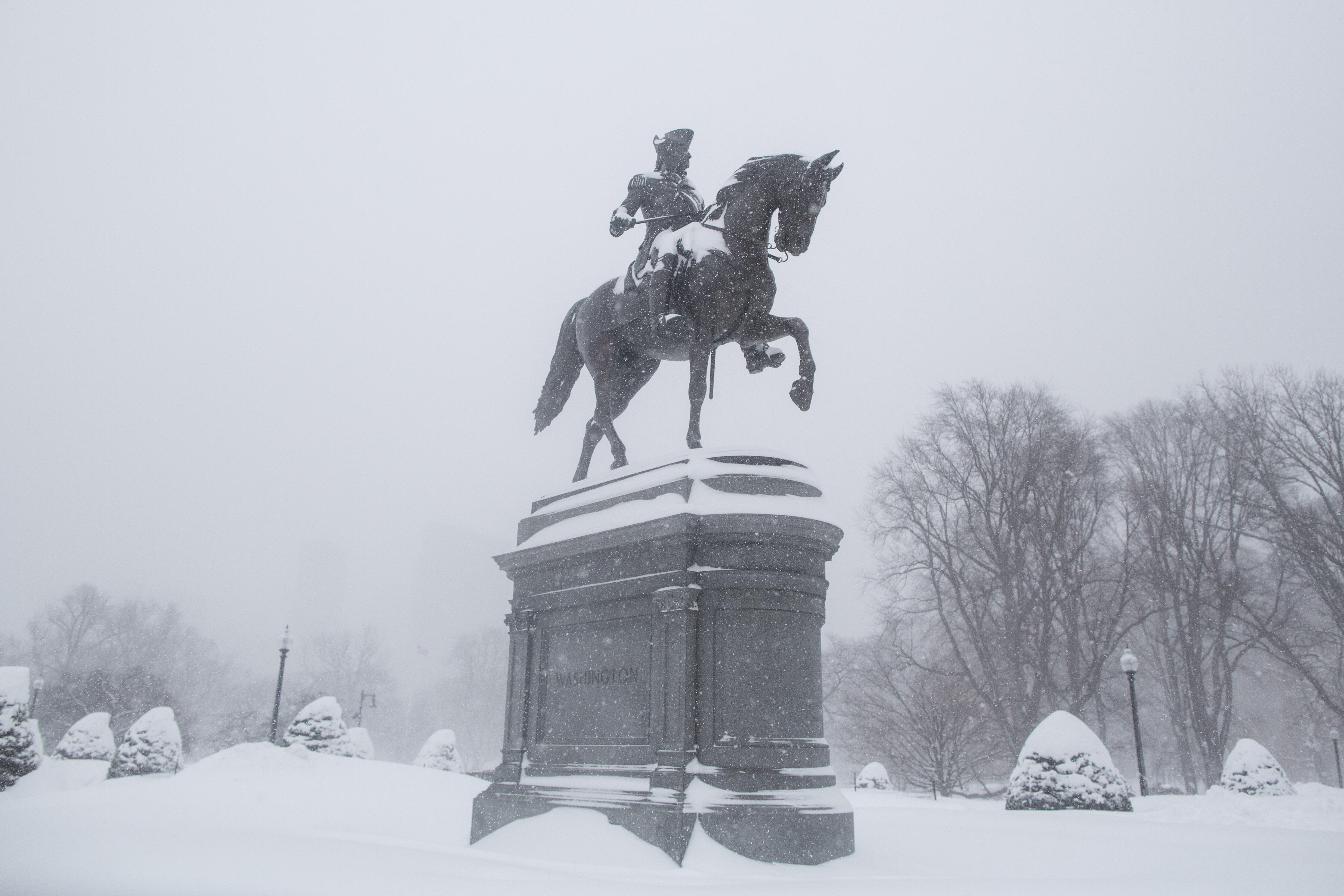 BOSTON, MA. - FEBRUARY 15: The snow covered George Washington statue in the Boston Public Garden during winter storm Neptune which dropped over a foot of snow February 15, 2015 in Boston, Massachusetts. This is the fourth major storm to hit the New Englan