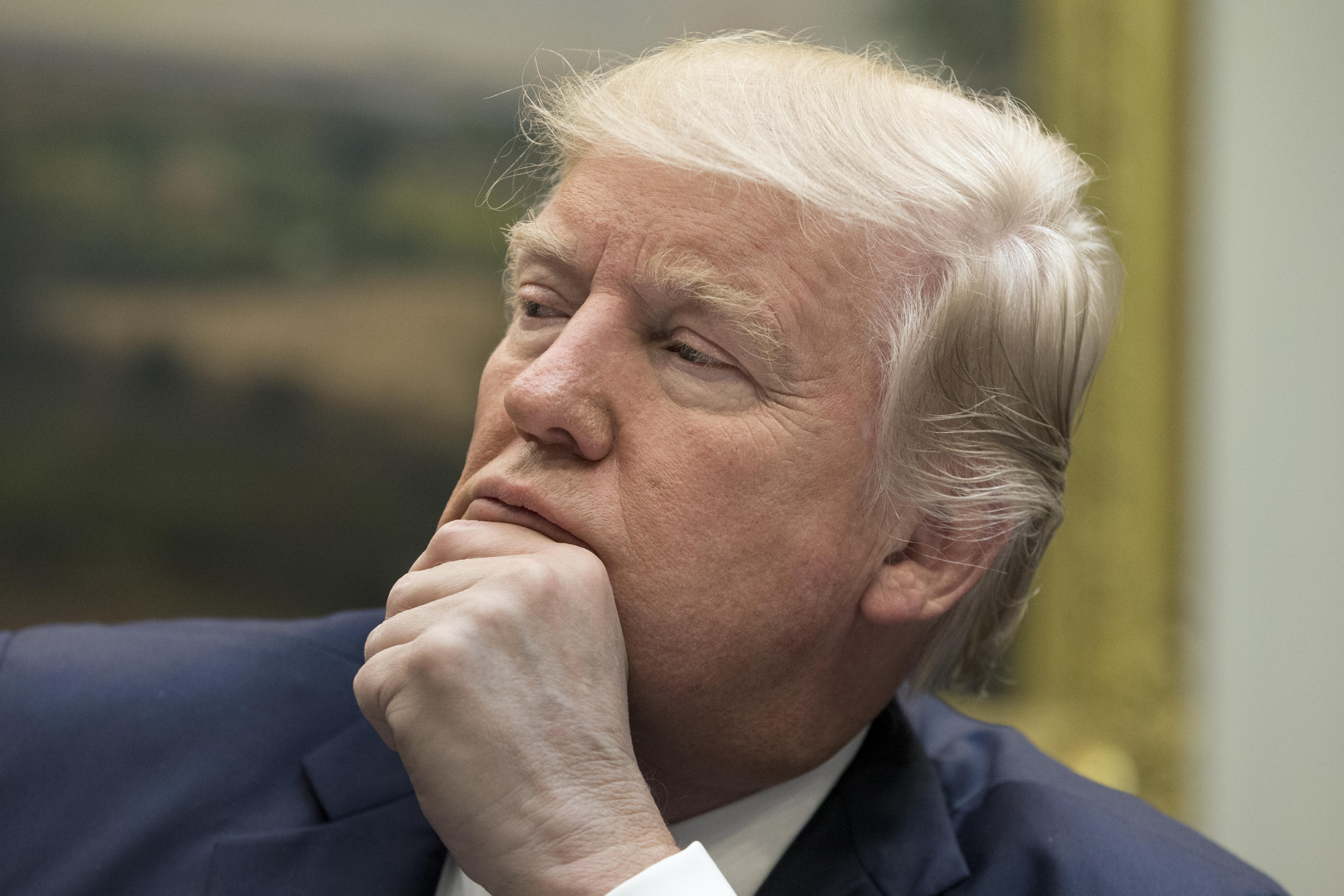 WASHINGTON, DC - MARCH 13: President Donald Trump attends a meeting on healthcare in the Roosevelt Room of the White House on March 13, 2017 in Washington, DC. The House Republicans' bill known as the 'American Health Care Act', which is intended to repla