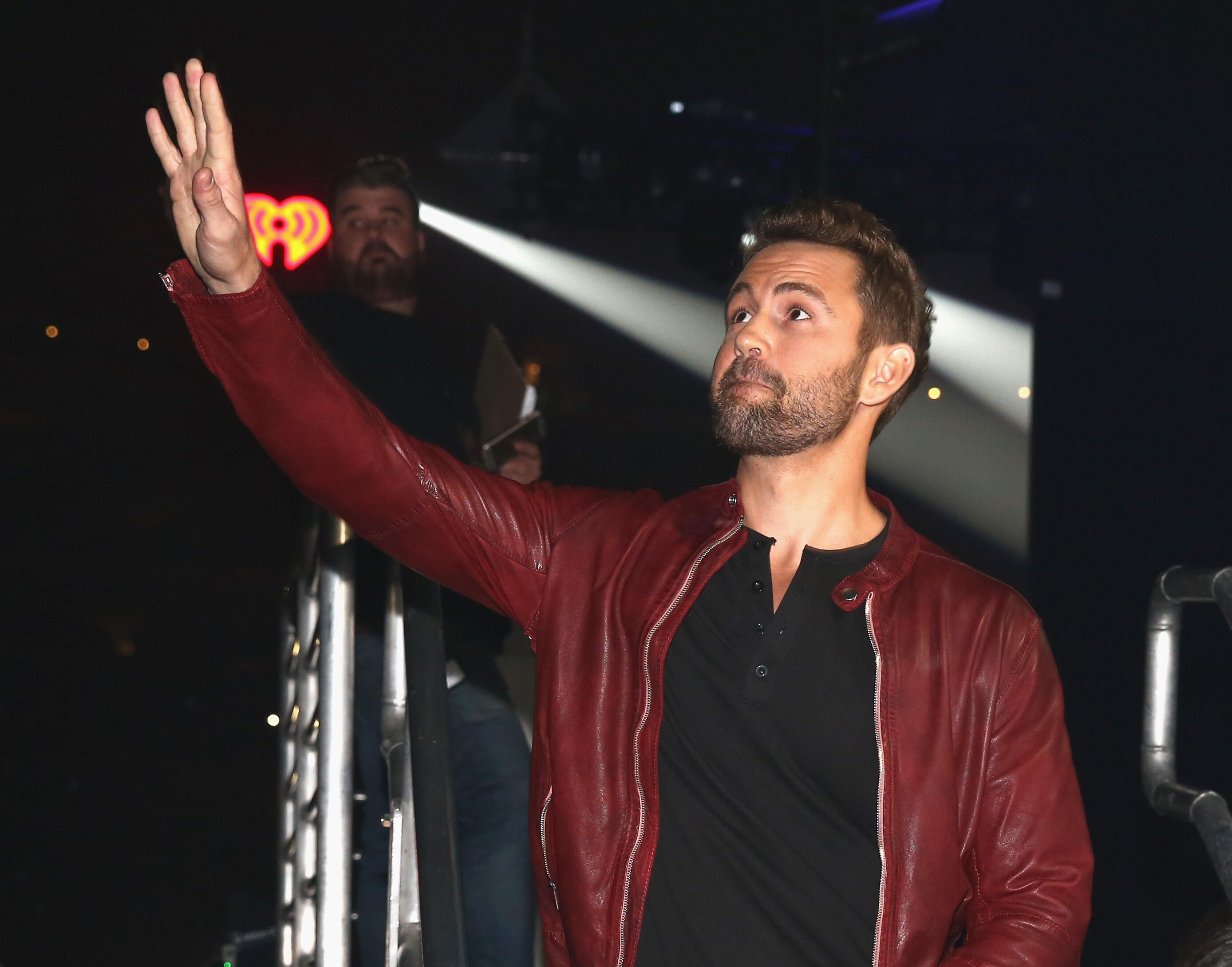 LOS ANGELES, CA - DECEMBER 02:  TV personality Nick Viall waves backstage during 102.7 KIIS FM's Jingle Ball 2016 presented by Capital One at Staples Center on December 2, 2016 in Los Angeles, California.  (Photo by Joe Scarnici/Getty Images for iHeartMed