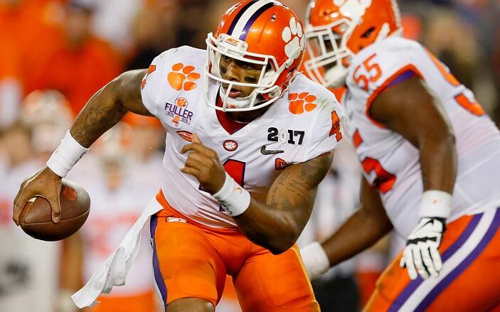 TAMPA, FL - JANUARY 09:  Quarterback Deshaun Watson #4 of the Clemson Tigers runs with the ball during the second half against the Alabama Crimson Tide in the 2017 College Football Playoff National Championship Game at Raymond James Stadium on January 9, 
