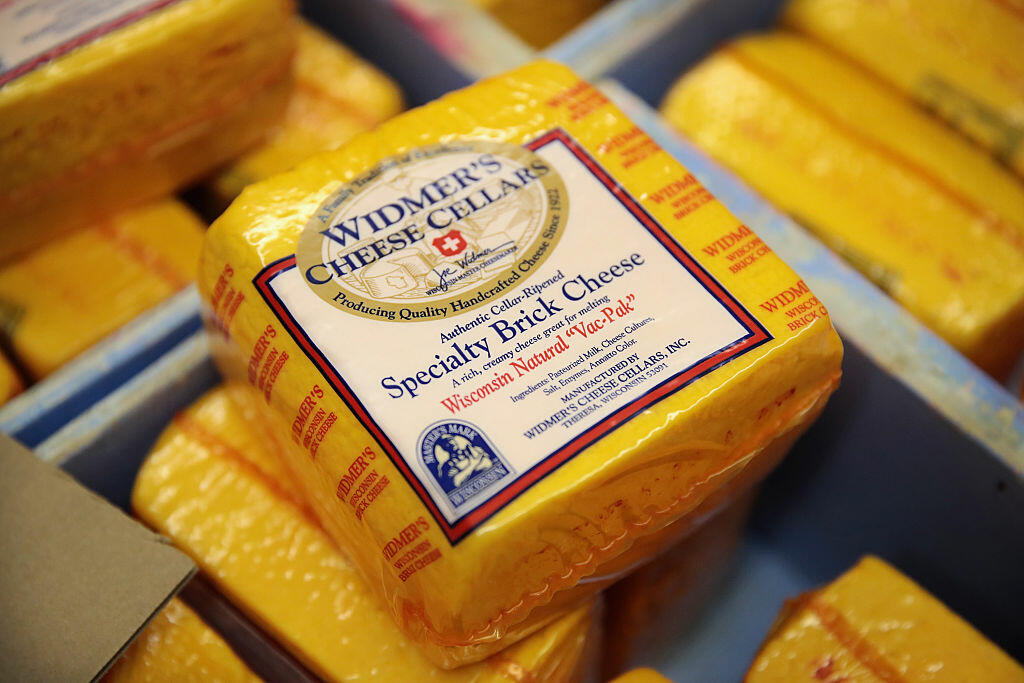 THERESA, WI - JUNE 27: Brick cheese packages are prepared for shipping at Widmer's Cheese Cellars on June 27, 2016 in Theresa, Wisconsin. Widmer's is an artisanal cheesemaker that has produced cheese in the same facility for four generations much the same way as it was made by the founder, with traditional open vats and curds being stirred and scooped into molds by hand.  Record dairy production in the United States has produced a record surplus of cheese causing prices to drop. Despite this surplus Widmer's says it continues to see growth as consumers continue to gravitate toward craft-made food products.  (Photo by Scott Olson/Getty Images)