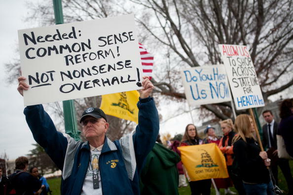WASHINGTON - NOVEMBER 21: Marty Lazar of Gainsville, VA, rallies against the Senate's health care reform bill outside Capitol Hill on November 21, 2009 in Washington, DC. The Senate is expected to cast a procedural vote on the measure later today after Se