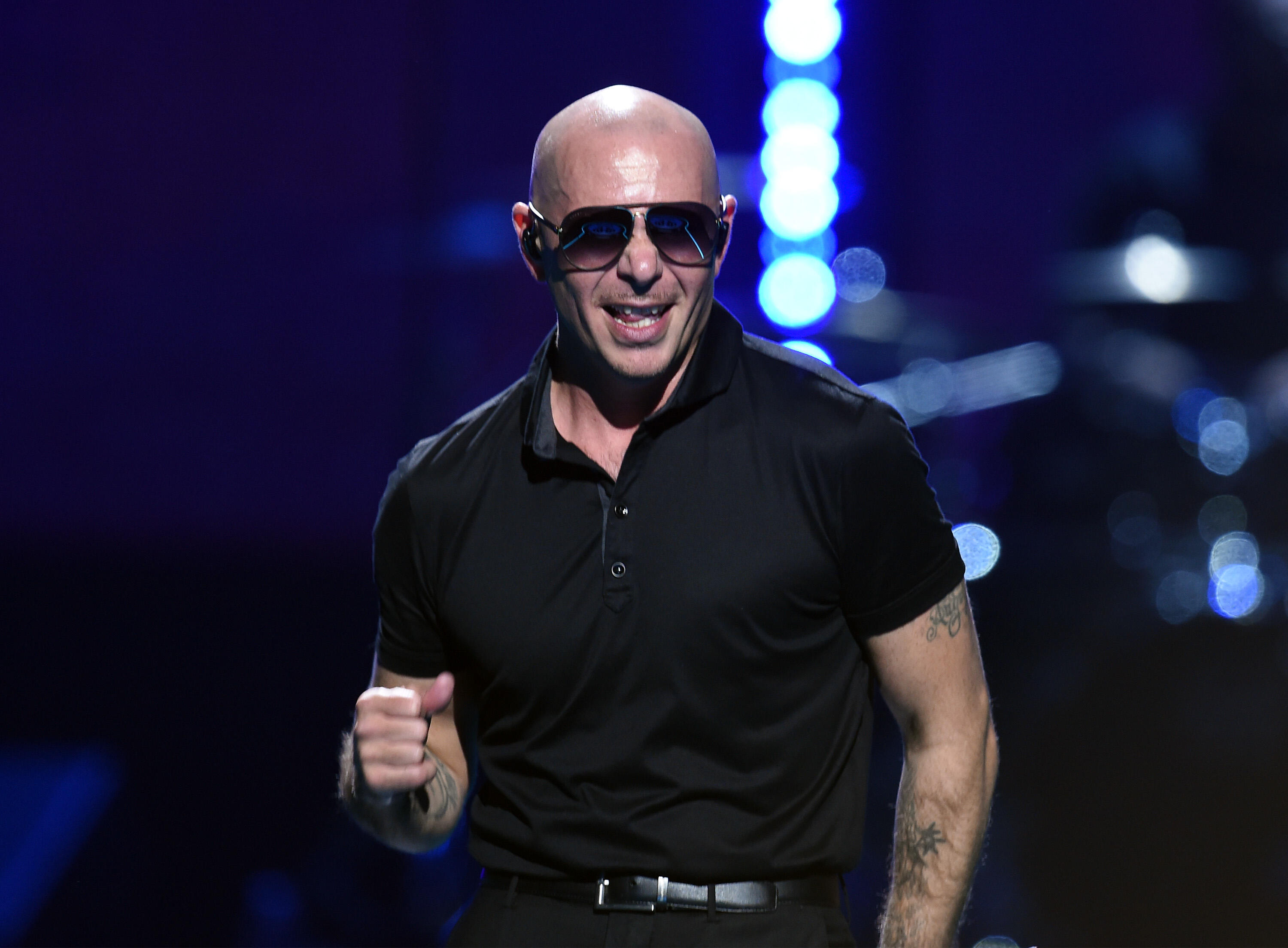 LAS VEGAS, NV - SEPTEMBER 24:  Recording artist Pitbull performs onstage at the 2016 iHeartRadio Music Festival at T-Mobile Arena on September 24, 2016 in Las Vegas, Nevada.  (Photo by Kevin Winter/Getty Images)