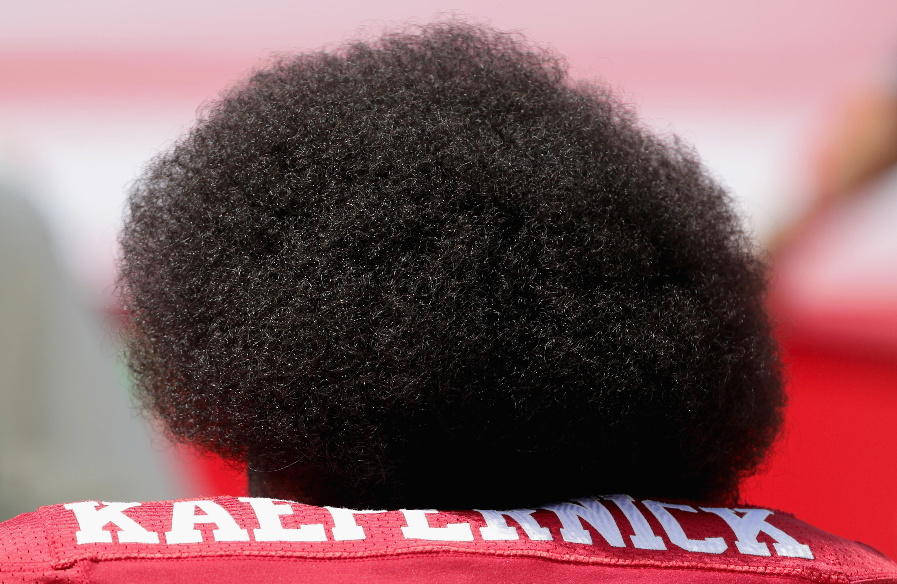 CHARLOTTE, NC - SEPTEMBER 18:   Colin Kaepernick #7 of the San Francisco 49ers kneels during the national anthem before their game against the Carolina Panthers at Bank of America Stadium on September 18, 2016 in Charlotte, North Carolina.  (Photo by Stre